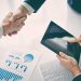 Negocios acuerdo con saludo de manos empresas confianza inversionista