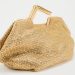 La joya minimalista de Zara: el mini bolso de aza metálica