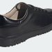Las Adidas Stan Smith Freizit son la reinvención más elegante de un clásico y quedan genial con traje oscuro